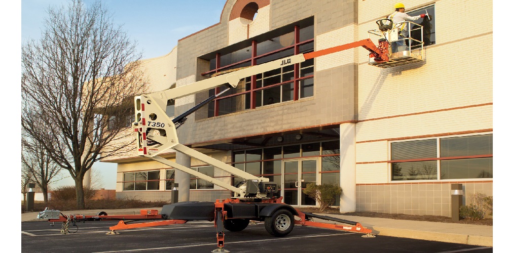 How is a towable boom helpful lift?